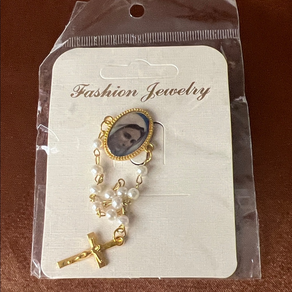 Virgin Mary brooch with small roseray pearls & crucifixtion cross
